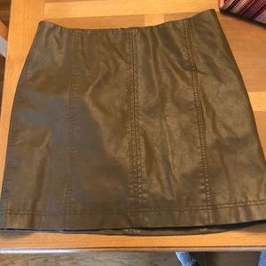Free people waist 28 length 15 inches 100% rayon leather like mini skirt